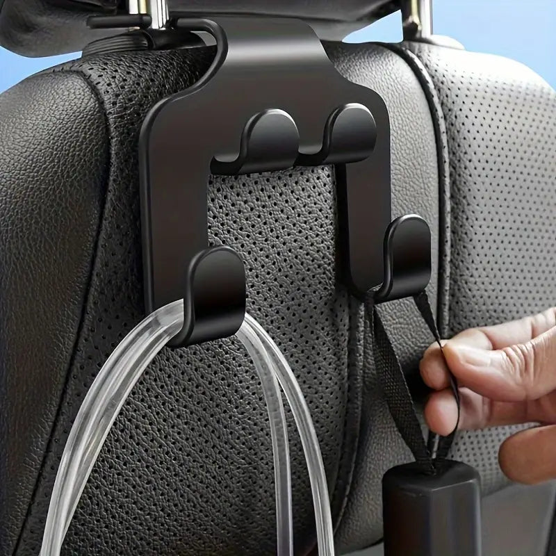 Image of KHAAS Headrest Hooks for Cars, showing the items hanging off the hook
