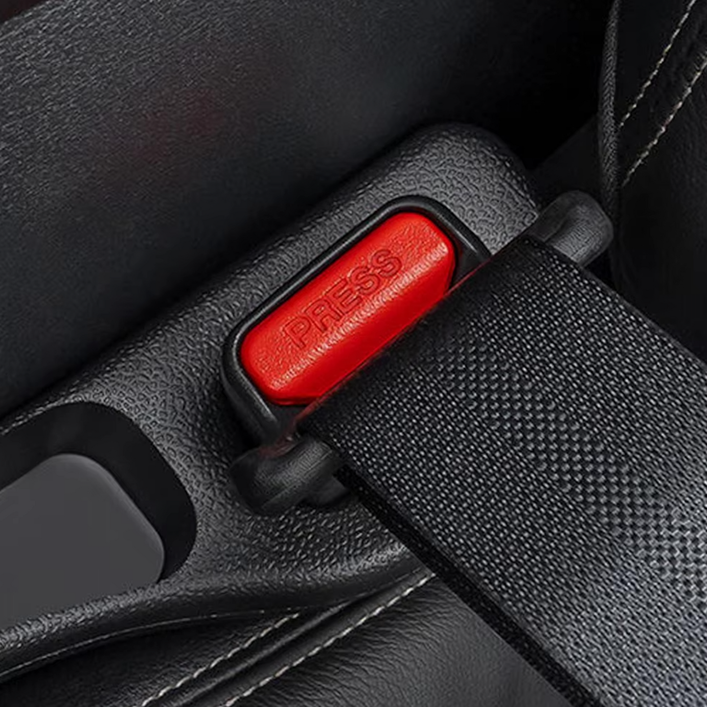 Image of KHAAS GapGuard™ Car Seat Gap Filler, showing the product mounting into seat belt