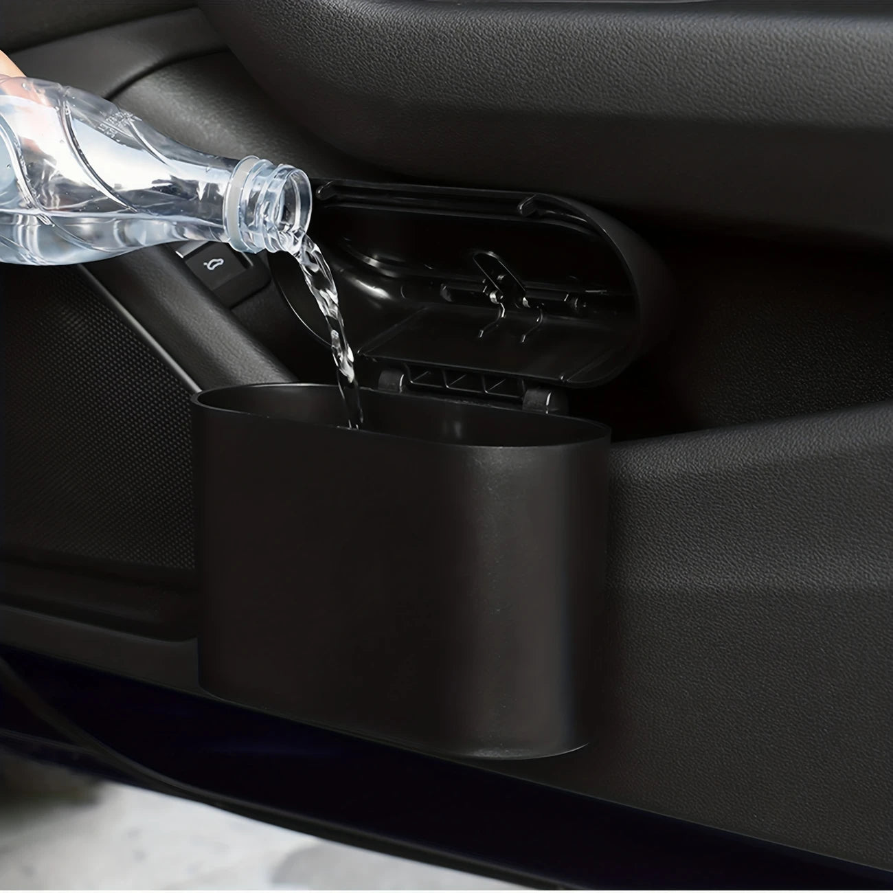 Image of KHAAS Trash Can for Car with Lid, showing the waterproofness of the product 