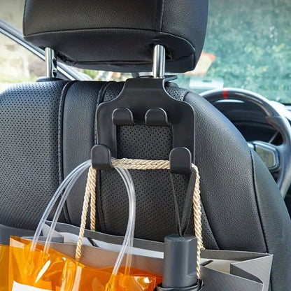 Image of KHAAS Headrest Hooks for Cars, showing items being hung off of the product 