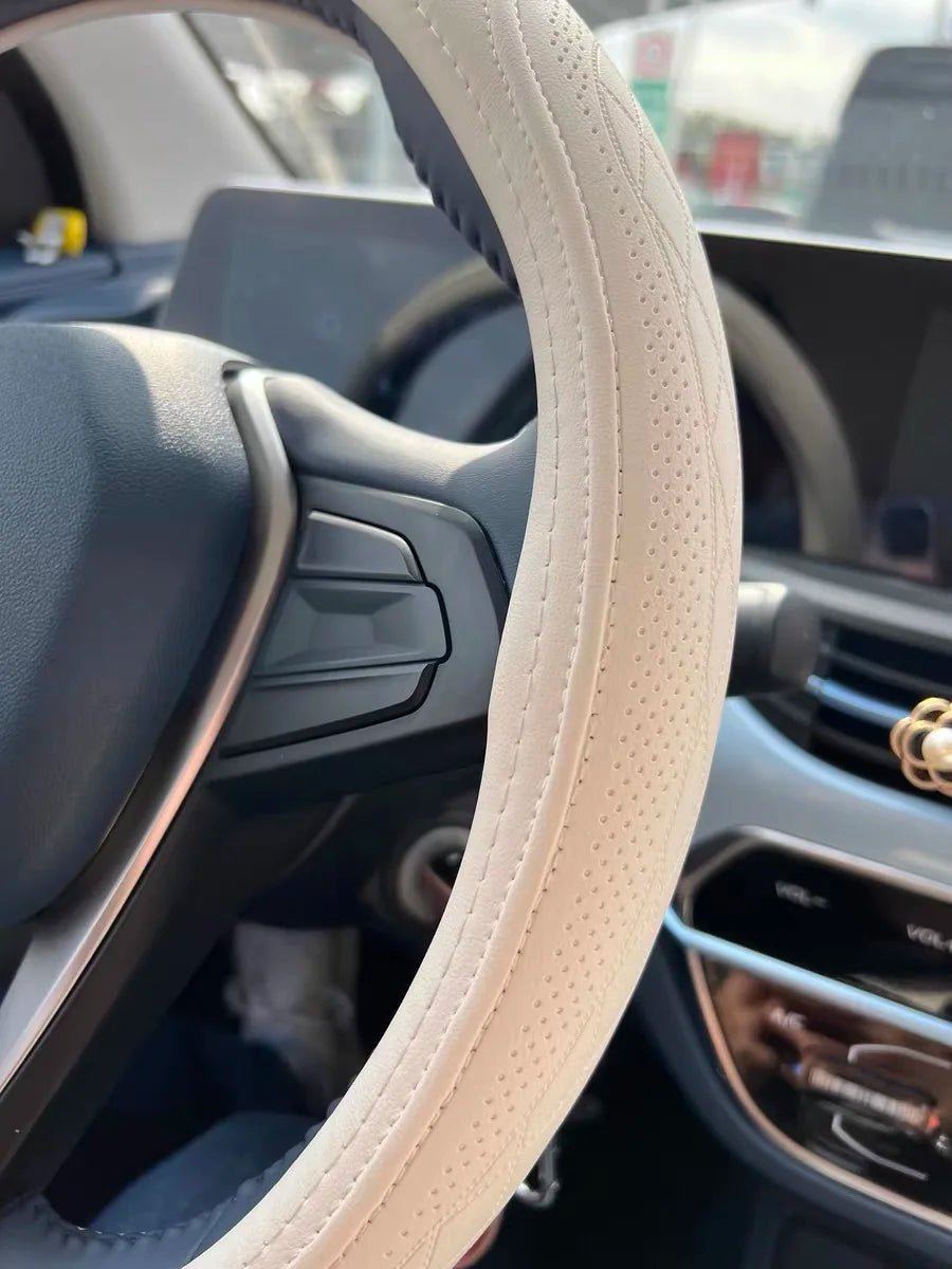Image of KHAAS Leather Steering Wheel Cover, showing the product in beige color. 